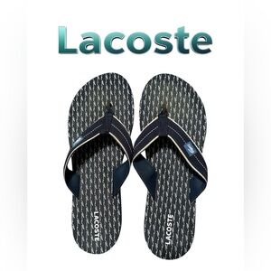 Lacoste Dark Blue Patterned Flip Flops features alligator footbed